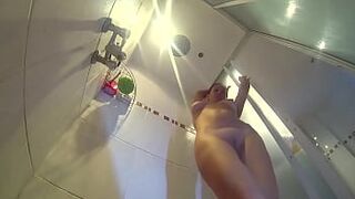 Nice lady wants to take a shower in the shower room. She undresses, shows striptease. Takes off her panties and leopard dressing gown. Shows her juicy shaved pussy. You can fuck a cutie in the shower room.
